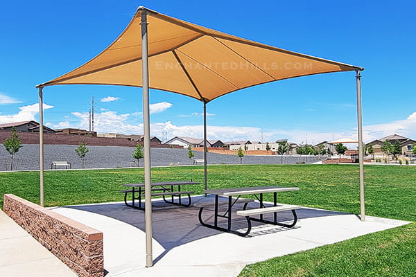 Shaded picnic tables at Bullseye Park