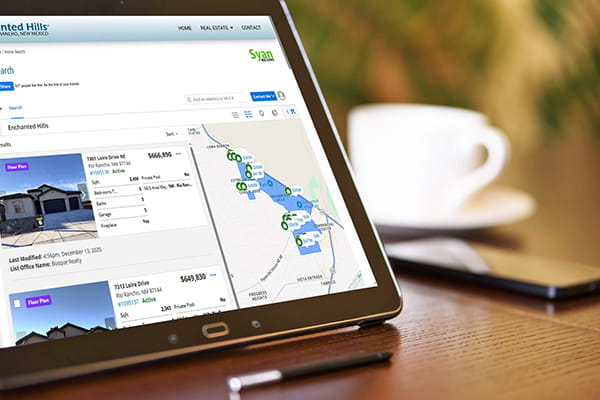 Tablet with Enchanted Hills home search on screen